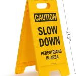 SmartSign - SF-0292-FB-25x12 Caution - Slow Down, Pedestrians In Area Folding Floor Sign By | 25" x 12" Plastic Black on Yellow
